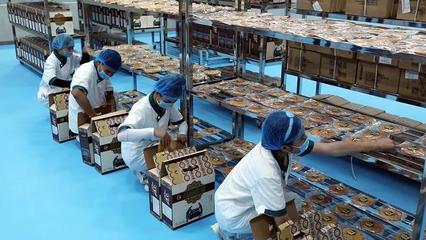 新疆霍尔果斯:小馕饼撬动大产业走出"国际范"